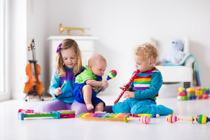 Encourage younger children with musical toys and instruments that let them explore on their own.